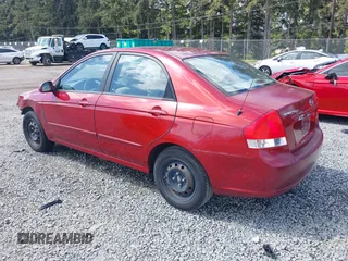 2009 Kia Spectra EX with VIN KNAFE222195661572, listed as a IAAI auction lot 42148750 with 137,773 mi miles. Bid and sale history available at carsss.com. Image 3.