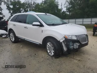 2015 Lincoln MKX z VIN 2LMDJ6JK7FBL23356, wystawiony jako Copart lot #56653295 z przebiegiem 101 982 mil mil oraz Szkoda całkowita • Salvage title. Historia ofert i sprzedaży dostępna na DreamBid. Obrazek 4.