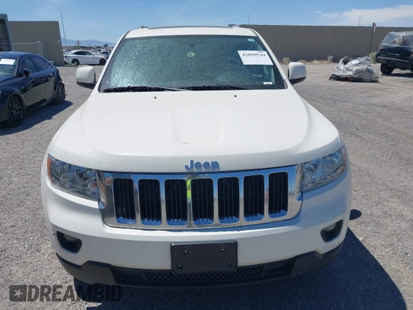 2012 Jeep Grand Cherokee Laredo with VIN 1C4RJEAG0CC210274, listed as a IAAI auction lot 42099944 with 177,527 mi miles. Bid and sale history available at carsss.com. Image 12.