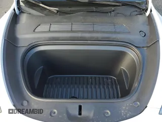 2023 Tesla Model Y Long Range with VIN 7SAYGAEE1PF967353, listed as a Copart auction lot 88700135 with 16,249 mi miles and Salvage Title. Bid and sale history available at DreamBid. Image 12.
