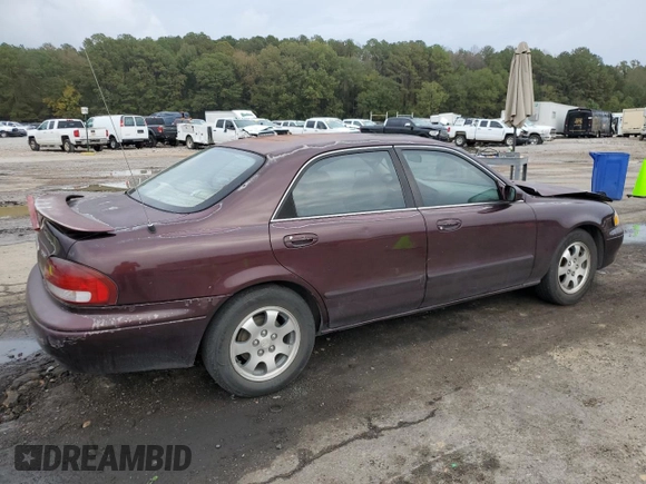 1998 Mazda 626 DX z VIN 1YVGF22CXW5775511, wystawiony jako Copart lot #78748784 z przebiegiem 158 570 mil mil oraz Szkoda całkowita • Salvage title. Historia ofert i sprzedaży dostępna na DreamBid. Obrazek 3.