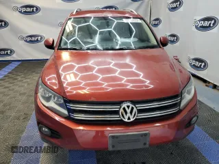 2012 Volkswagen Tiguan SE z VIN WVGAV7AX9CW002143, wystawiony jako Copart lot #55820395 z przebiegiem 174 356 mil mil oraz Czysty tytuł • Clean title. Historia ofert i sprzedaży dostępna na DreamBid. Obrazek 5.