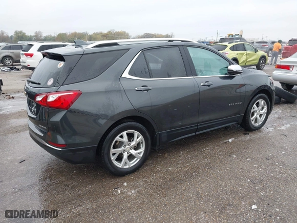 2021 Chevrolet Equinox Premier with VIN 2GNAXNEV2M6154439, listed as a IAAI auction lot 40876413 with 35,174 mi miles. Bid and sale history available at carsss.com. Image 4.