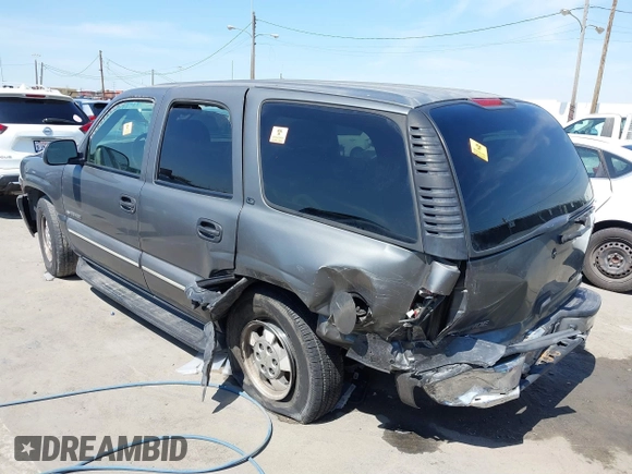 2002 Chevrolet Tahoe LS z VIN 1GNEC13V92R305304, wystawiony jako IAAI lot #41851210 z przebiegiem Nie podano mil oraz . Historia ofert i sprzedaży dostępna na DreamBid. Obrazek 3.