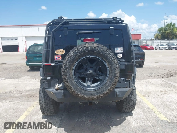 2012 Jeep Wrangler Unlimited Altitude with VIN 1C4HJWEG5CL161049, listed as a IAAI auction lot 42629330 with 217,147 mi miles and . Bid and sale history available at DreamBid. Image 16.