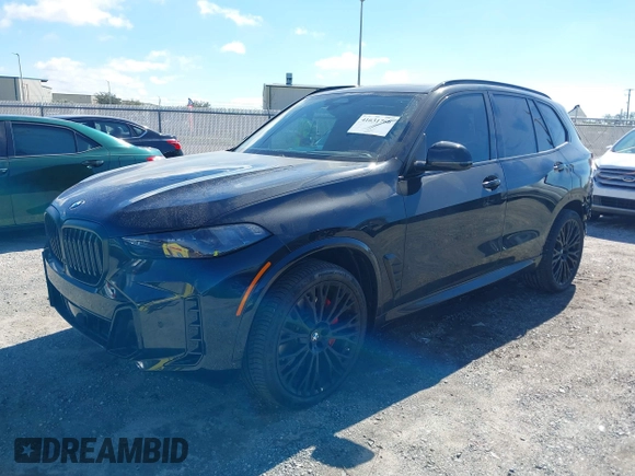 2025 BMW X5 sDrive40i with VIN 5UX13EU01S9W88784, listed as a IAAI auction lot 41631766 with 12,805 mi miles. Bid and sale history available at carsss.com. Image 18.