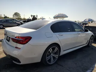 2019 BMW 7 Series 750i with VIN WBA7F0C5XKGM25771, listed as a Copart auction lot 47239195 with 73,691 mi miles and Salvage Title. Bid and sale history available at carsss.com. Image 3.