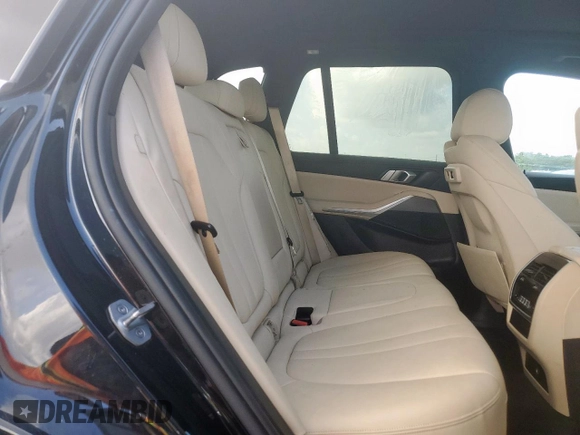 2019 BMW X5 xDrive40i with VIN 5UXCR6C54KLL35873, listed as a Copart auction lot 64989745 with 129,538 mi miles and Salvage title. Bid and sale history available at DreamBid. Image 11.