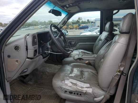 1999 Chevrolet Suburban with VIN 1GNFK16R9XJ516000, listed as a Copart auction lot 73854994 with 263,079 mi miles and Salvage Title. Bid and sale history available at carsss.com. Image 7.