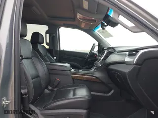 2017 Chevrolet Tahoe LT with VIN 1GNSCBKC0HR228016, listed as a IAAI auction lot 41232841 with 105,385 mi miles. Bid and sale history available at carsss.com. Image 5.