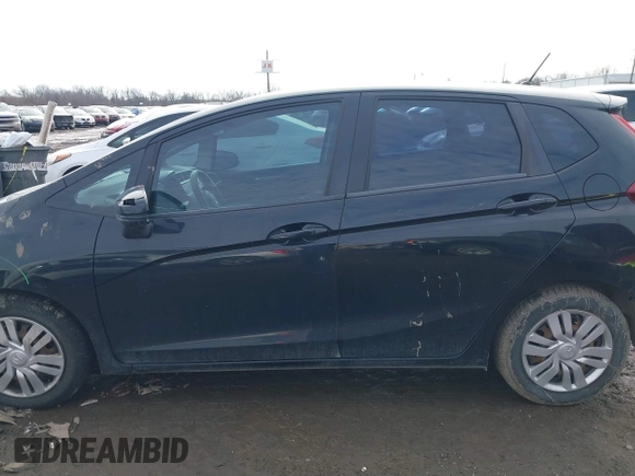 2015 Honda Fit LX with VIN 3HGGK5H50FM768011, listed as a IAAI auction lot 41499374 with 142,211 mi miles and . Bid and sale history available at DreamBid. Image 15.