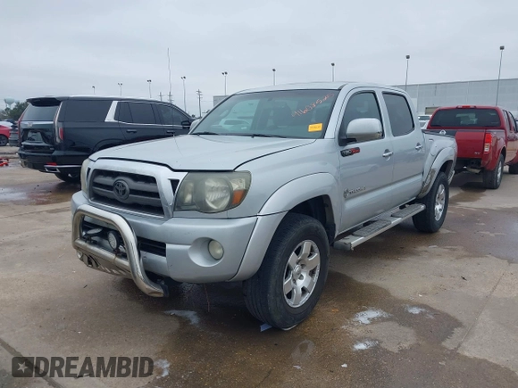 2009 Toyota Tacoma PreRunner with VIN 3TMJU62NX9M081748, listed as a IAAI auction lot 41608525 with 210,999 mi miles. Bid and sale history available at carsss.com. Image 18.