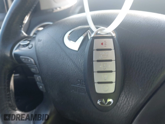 2015 Infiniti QX60 with VIN 5N1AL0MMXFC554836, listed as a IAAI auction lot 42435050 with 115,225 mi miles and . Bid and sale history available at DreamBid. Image 11.