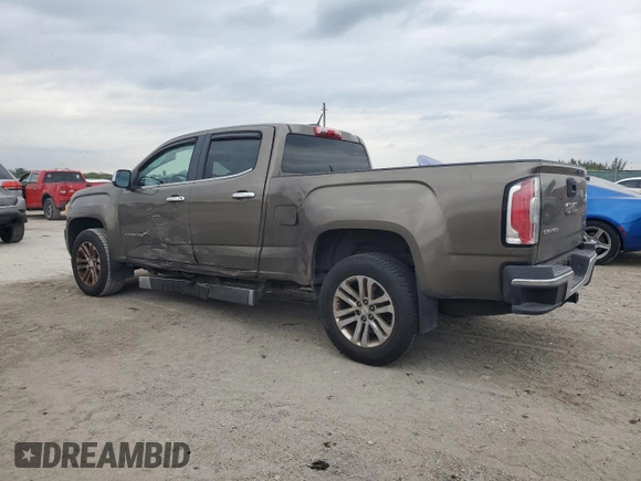 2015 GMC Canyon 2WD SLT with VIN 1GTG5CE31F1118775, listed as a Copart auction lot 45272905 with 119,639 mi miles and Salvage Title. Bid and sale history available at carsss.com. Image 2.