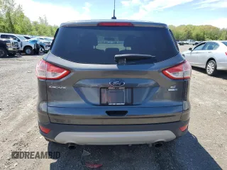 2015 Ford Escape SE with VIN 1FMCU9GX7FUB34767, listed as a Copart auction lot 55522625 with 83,046 mi miles and Clean Title. Bid and sale history available at DreamBid. Image 6.