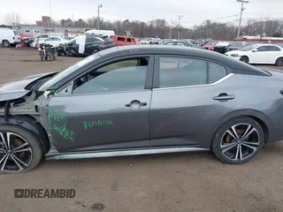2021 Nissan Sentra SR z VIN 3N1AB8DV4MY302599, wystawiony jako IAAI lot #41662536 z przebiegiem 36 905 mil mil oraz . Historia ofert i sprzedaży dostępna na DreamBid. Obrazek 15.