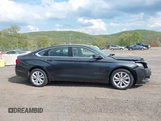 2018 Chevrolet Impala LT with VIN 2G1105S38J9147336, listed as a IAAI auction lot 42146904 with 76,959 mi miles and . Bid and sale history available at DreamBid. Image 14.