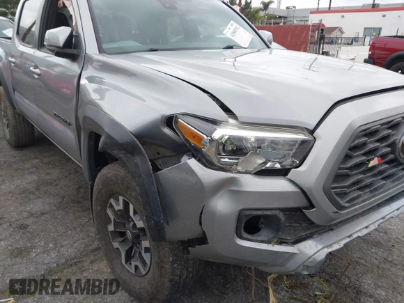 2021 Toyota Tacoma SR z VIN 3TMCZ5AN3MM374132, wystawiony jako IAAI lot #42068562 z przebiegiem 38 654 mil mil oraz . Historia ofert i sprzedaży dostępna na DreamBid. Obrazek 20.