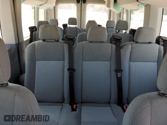 2015 Ford Transit XL z VIN 1FBZX2CM8FKA64060, wystawiony jako Copart lot #74784034 z przebiegiem 33 249 mil mil oraz Szkoda całkowita • Salvage title. Historia ofert i sprzedaży dostępna na DreamBid. Obrazek 10.