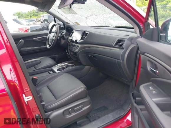 2023 Honda Ridgeline RTL with VIN 5FPYK3F53PB059323, listed as a IAAI auction lot 42485621 with Not provided miles and . Bid and sale history available at DreamBid. Image 5.