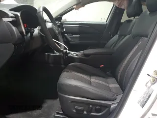 2025 Mazda CX-50 S Premium z VIN 7MMVABDM8SN311953, wystawiony jako Copart lot #58232445 z przebiegiem 5 932 mil mil oraz Szkoda całkowita • Salvage title. Historia ofert i sprzedaży dostępna na DreamBid. Obrazek 7.