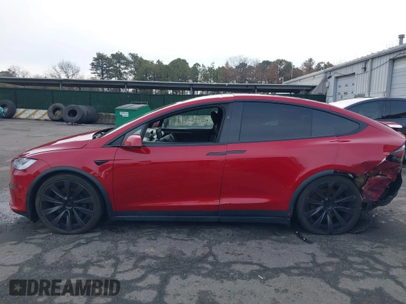 2022 Tesla Model X Plaid with VIN 7SAXCBE60NF330246, listed as a IAAI auction lot 41477394 with 51,612 mi miles and . Bid and sale history available at DreamBid. Image 14.