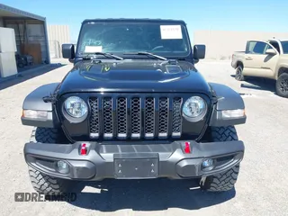 2023 Jeep Gladiator Rubicon z VIN 1C6JJTBG3PL531982, wystawiony jako IAAI lot #42211139 z przebiegiem 28 301 mil mil oraz . Historia ofert i sprzedaży dostępna na DreamBid. Obrazek 12.