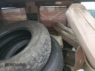 2003 GMC Safari z VIN 1GDEL19XX3B510573, wystawiony jako Copart lot #68429614 z przebiegiem Nie podano mil oraz Szkody całkowita. Historia ofert i sprzedaży dostępna na DreamBid. Obrazek 11.