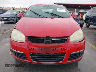 2009 Volkswagen Jetta Sedan SE with VIN 3VWRM71K99M123288, listed as a IAAI auction lot 41892948 with 345,159 mi miles. Bid and sale history available at carsss.com. Image 12.
