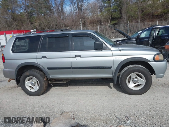 2000 Mitsubishi Montero LS z VIN JA4LS31H9YP005577, wystawiony jako IAAI lot #41590624 z przebiegiem 149 625 mil mil oraz . Historia ofert i sprzedaży dostępna na DreamBid. Obrazek 13.