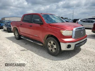 2012 Toyota Tundra 4WD Truck with VIN 5TFDM5F10CX036009, listed as a Copart auction lot 70593794 with 251,685 mi miles and Salvage Title. Bid and sale history available at carsss.com. Image 4.