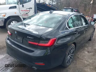 2021 BMW 3 Series 330i xDrive with VIN 3MW5R7J03M8C09356, listed as a IAAI auction lot 41804038 with 86,239 mi miles and . Bid and sale history available at DreamBid. Image 4.