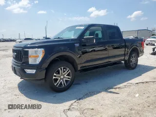 2021 Ford F-150 XL with VIN 1FTEW1EP9MFB94496, listed as a Copart auction lot 59283315 with 30,753 mi miles and Salvage title. Bid and sale history available at DreamBid. Image 1.