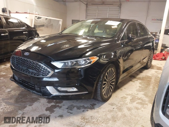 2017 Ford Fusion Titanium с VIN 3FA6P0SU8HR215570, выставлен на аукционе IAAI как лот 41427407 с пробегом 97 281 миль миль и . История ставок и продаж доступна на DreamBid. Изображение 17.
