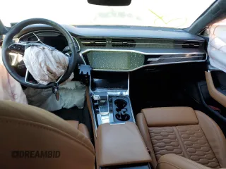 2021 Audi RS 7 z VIN WUAPCBF26MN906501, wystawiony jako Copart lot #37039103 z przebiegiem Nie podano mil oraz . Historia ofert i sprzedaży dostępna na DreamBid. Obrazek 8.