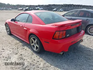 2003 Ford Mustang GT Deluxe with VIN 1FAFP42X13F315422, listed as a IAAI auction lot 42282000 with 200,721 mi miles and . Bid and sale history available at DreamBid. Image 3.
