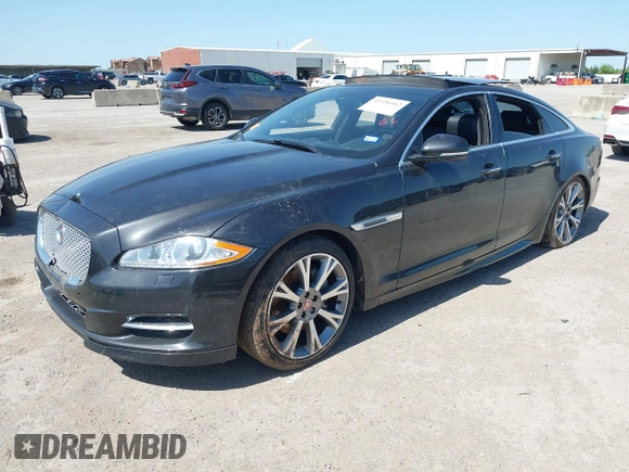 2015 Jaguar XJ R-Sport with VIN SAJWJ1CD6F8V83990, listed as a IAAI auction lot 41936162 with Not Provided miles and . Bid and sale history available at DreamBid. Image 17.