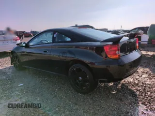 2002 Toyota Celica GT with VIN JTDDR32T620116886, listed as a Copart auction lot 82425874 with 203,196 mi miles and Salvage Title. Bid and sale history available at carsss.com. Image 2.