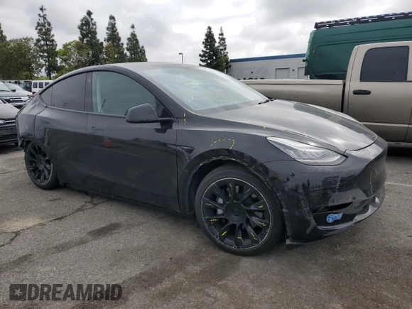 2021 Tesla Model Y Long Range z VIN 5YJYGAEE5MF143672, wystawiony jako Copart lot #55962875 z przebiegiem 74 644 mil mil oraz Szkoda całkowita • Salvage title. Historia ofert i sprzedaży dostępna na DreamBid. Obrazek 4.