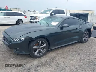 2015 Ford Mustang V6 with VIN 1FA6P8AM3F5344333, listed as a IAAI auction lot 42623531 with 121,278 mi miles and . Bid and sale history available at DreamBid. Image 2.