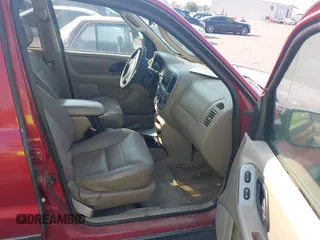 2004 Ford Escape XLT with VIN 1FMYU93114KB38538, listed as a IAAI auction lot 42678317 with 180,106 mi miles and . Bid and sale history available at DreamBid. Image 5.