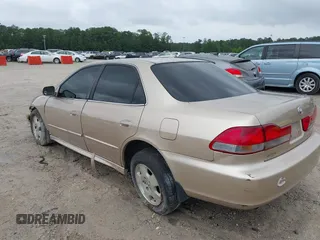 2001 Honda Accord EX z VIN 1HGCG16561A080094, wystawiony jako IAAI lot #42230752 z przebiegiem 246 469 mil mil oraz . Historia ofert i sprzedaży dostępna na DreamBid. Obrazek 3.