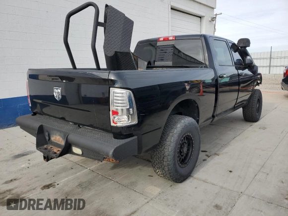 2013 Ram 2500 Laramie with VIN 3C6UR5FL7DG517729, listed as a Copart auction lot 79137974 with 217,387 mi miles and Salvage title. Bid and sale history available at DreamBid. Image 3.