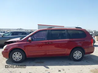 2012 Kia Sedona LX with VIN KNDMG4C70C6463190, listed as a IAAI auction lot 41781336 with 179,860 mi miles. Bid and sale history available at carsss.com. Image 14.