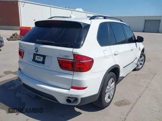 2012 BMW X5 35d z VIN 5UXZW0C57CL672538, wystawiony jako IAAI lot #41967268 z przebiegiem 141 996 mil mil oraz . Historia ofert i sprzedaży dostępna na DreamBid. Obrazek 4.