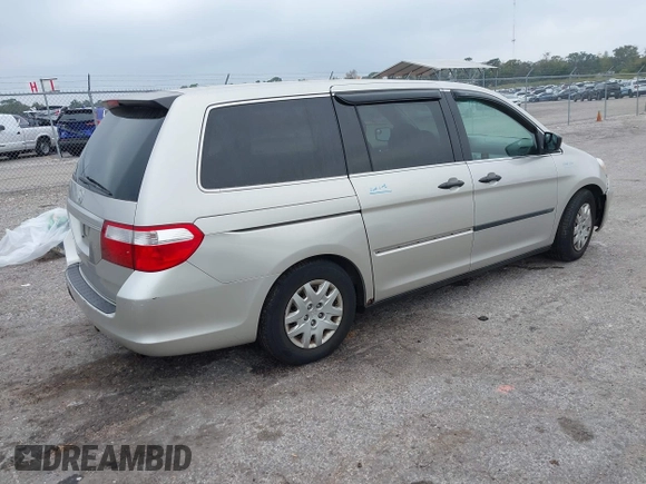 2006 Honda Odyssey LX with VIN 5FNRL38206B129663, listed as a IAAI auction lot 40978284 with 290,666 mi miles. Bid and sale history available at carsss.com. Image 4.