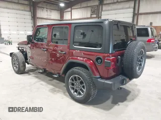 2021 Jeep Wrangler Unlimited Sport S with VIN 1C4HJXDN1MW596334, listed as a IAAI auction lot 41730278 with 64,126 mi miles and . Bid and sale history available at DreamBid. Image 3.