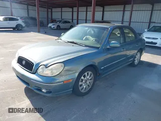 2004 Hyundai Sonata GLS with VIN KMHWF35H84A049046, listed as a IAAI auction lot 42071777 with 158,148 mi miles. Bid and sale history available at carsss.com. Image 2.