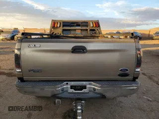 2002 Ford F-150 XL with VIN 1FTRF18262NB35586, listed as a Copart auction lot 77114114 with 166,942 mi miles and Salvage title. Bid and sale history available at DreamBid. Image 6.