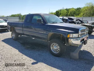 2001 Dodge 2500 with VIN 1B7KF23Z81J581286, listed as a Copart auction lot 54329385 with 148,859 mi miles and Salvage title. Bid and sale history available at DreamBid. Image 4.